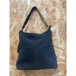 Bolso con Tachuelas Doradas y Flecos